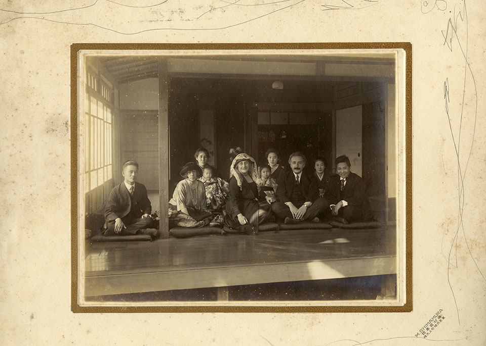 This photograph displays ten people sitting, three of which are Elsa Einstein, Albert Einstein, and Sanehiko Yamamoto. 