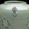 Celadon Jar with Slip-inlaid Floral Motifs